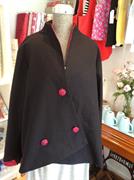 Black linen jacket with patterned fabric buttons and lining